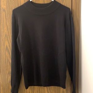 Black crewneck sweater